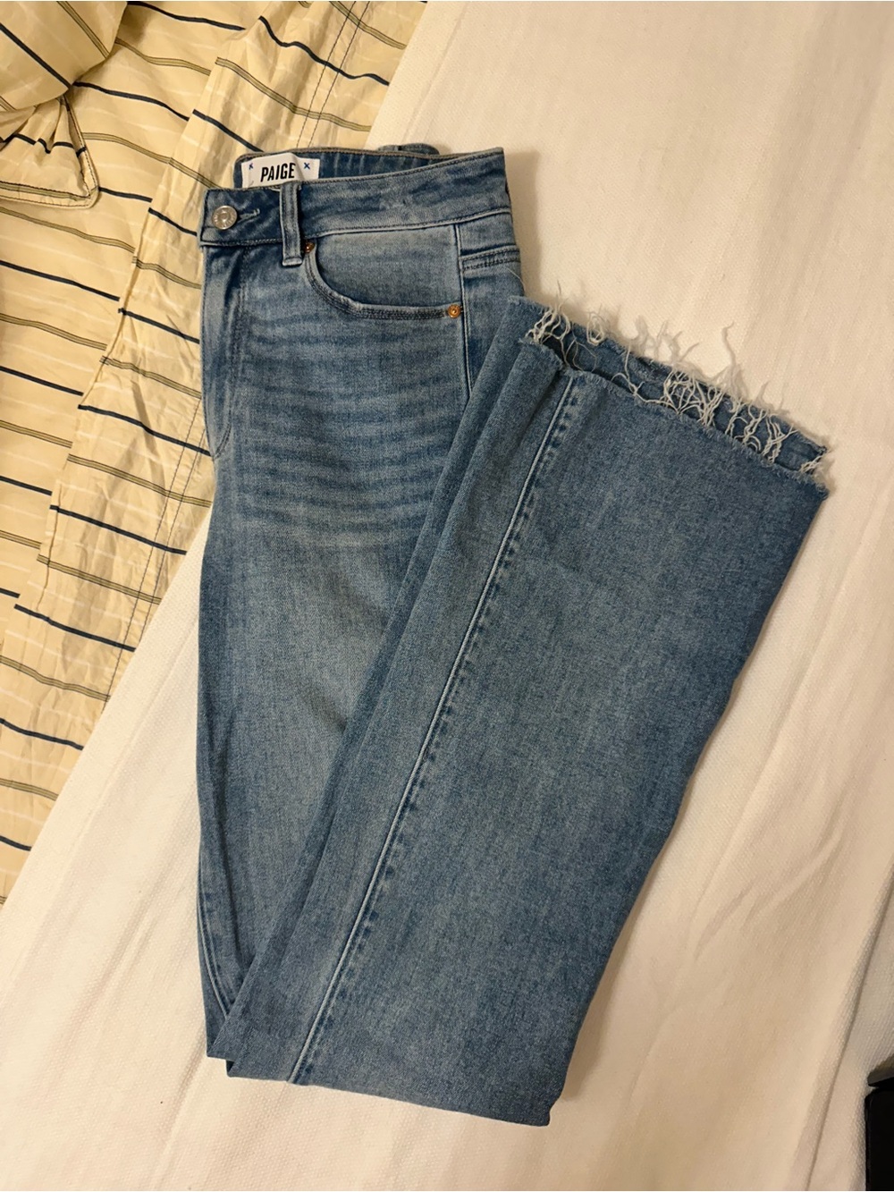 PAIGE Light Blue Jeans with Frayed Hem